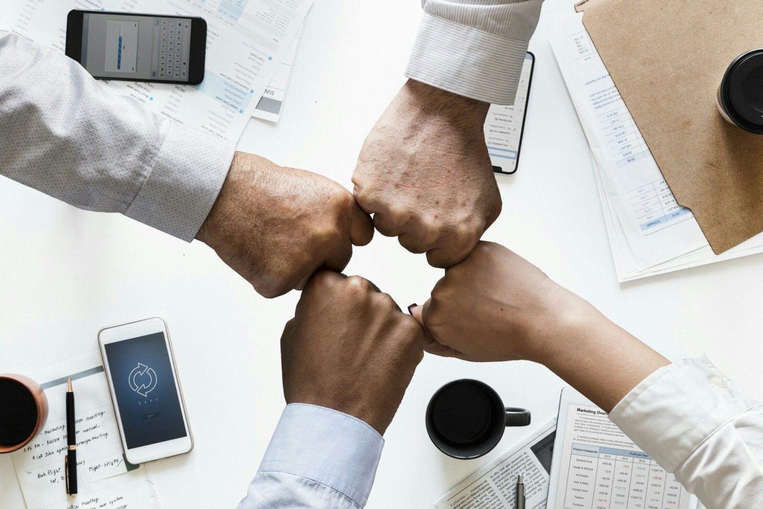 A group of business people fist fist fist fist fist fist fist fist.